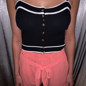 Tank top and beach shorts